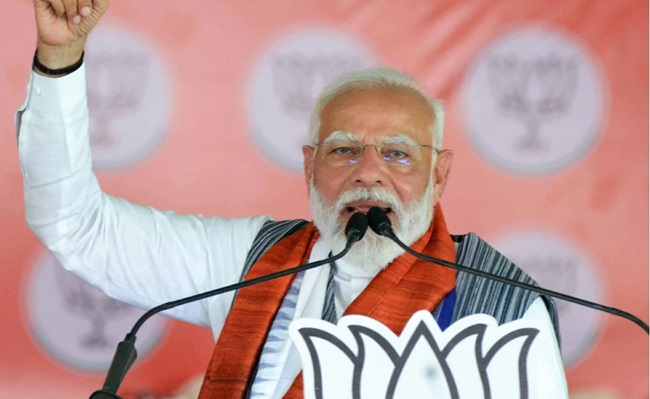 PM Modi takes opposition to cleaners on EVMs, once again