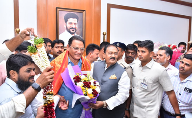 Azharuddin takes charge as minister