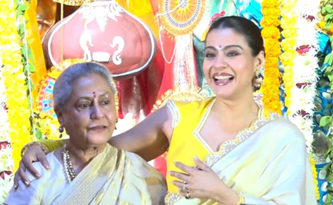 Jaya Bachchan gives Kajol a tight hug on Saptami celebrations