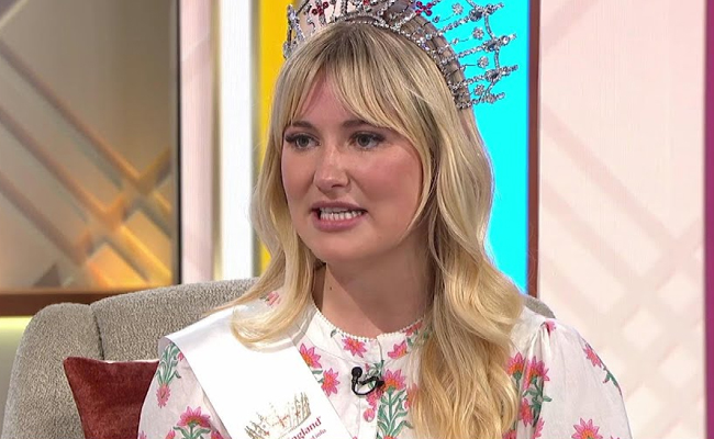 Who were the Rich men seated with Miss England?